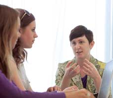 Students talking with teacher