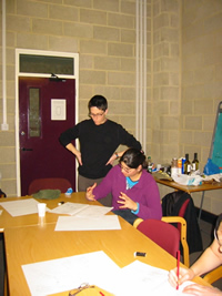 Alison gives advice to centre members at the cartooning workshop