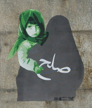 Tehran Street Art Child holding peace sign